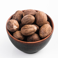 aromatic nutmeg on a white acrylic background