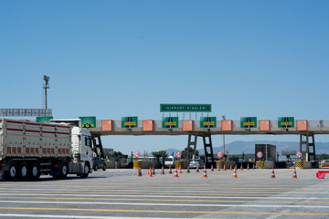 Cars passing through the toll gate