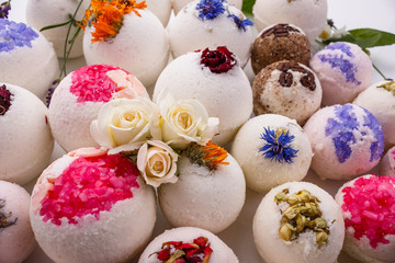 bath bombs on a white acrylic background