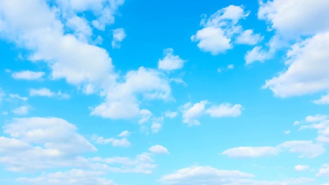 Light blue sky and white cumulus clouds - Seamless loop timelapse 4K