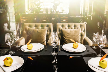 Empty glasses set in restaurant. Part of interior