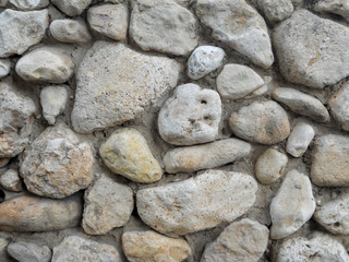 Large stones background, boulders fence