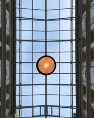 Red lamp on blue sky ceiling