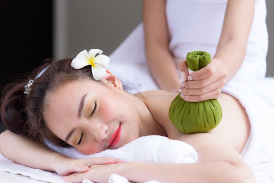 Portrait of beautiful asian people with close up view and close up eyes and having hand massage in spa salon. Beauty, healthy, spa and relaxation concept.