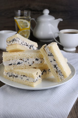 Sandwiches with ricotta and olives