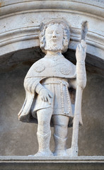 Fototapeta na wymiar Statue of St. Roch on the St Mark's Cathedral in the historic city Korcula at the island Korcula in Croatia on November 09, 2016.