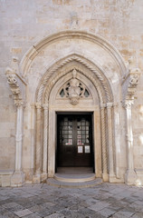 Fototapeta na wymiar Portal of the St Mark s Cathedral in the historic city Korcula at the island Korcula in Croatia