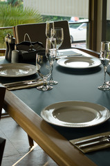 Empty glasses in restaurant, table setting