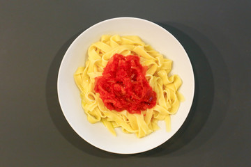 handmade pasta tagliatelle with tomato