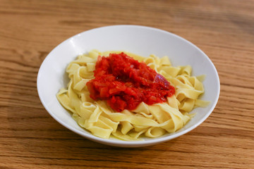handmade pasta tagliatelle with tomato