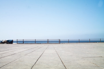 Square near the sea with a view of the horizon