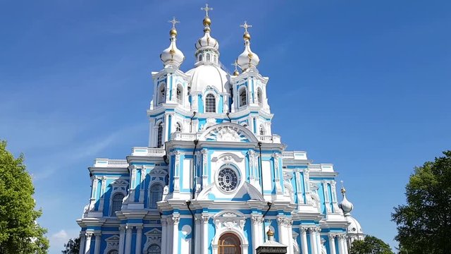 Beautiful bright blue and white Smolny Cathedral in St. Petersburg, Russia. Spring warm clear day. Baroque style