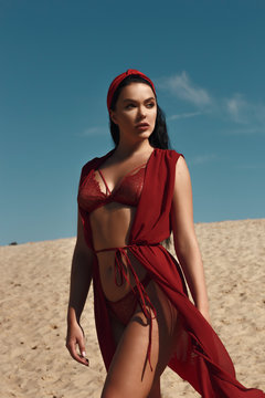 Girl in red lingerie outdoor