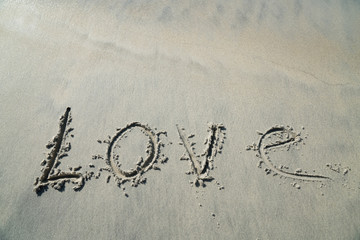 love, dream, nature, life  drawn sand on the beach