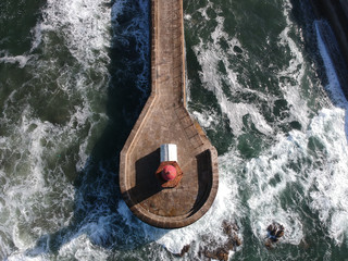 Top down view of lighthouse in the Atlantic - Porto, Portugal 2018