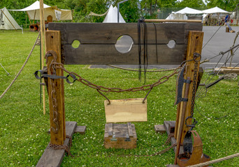 Reconstruction of an outdoor pillory at a medieval festival