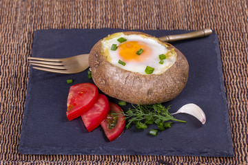 Baked potatoes stuffed with cheese and egg