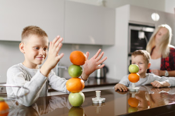 mom and children preparing breakfast