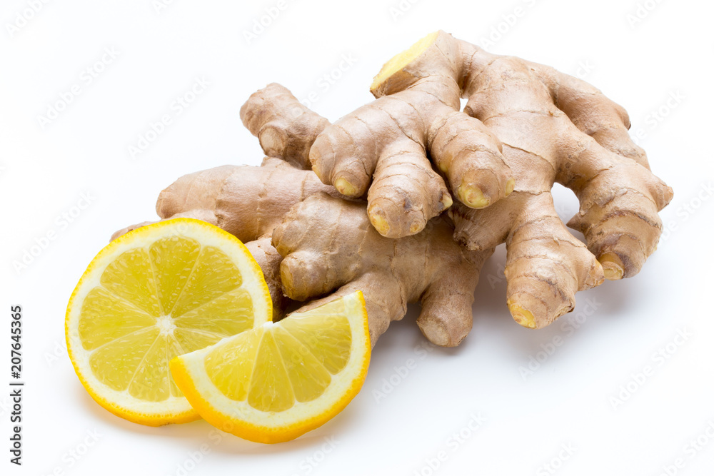 Wall mural Ginger bio and lemon on white background.