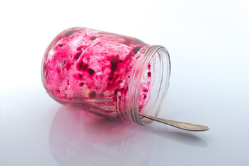 empty jar of jam on mirror background