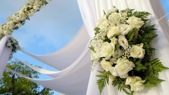 Beautiful video 4k of the Jewish Hupa.Closeup on a bouquet from roses