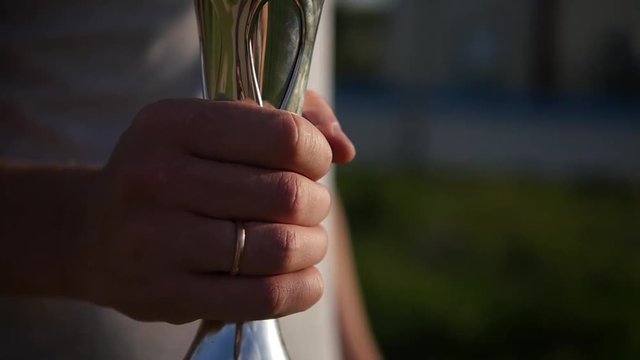 The prize cup for the first place. Slow motion video.