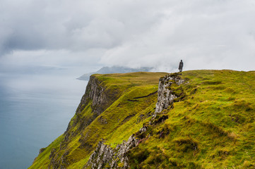Hiker in the rain in Scotland