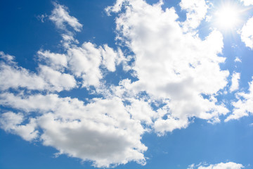 Obraz premium white clouds on the beautiful blue sky. Partly cloudy
