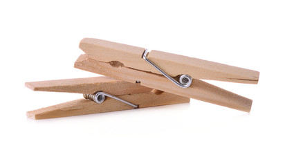 Wooden clothespins isolated on white background