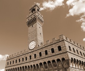 Obraz premium Florence in Italy The Old Palace and clock tower with blue sky with spia effect