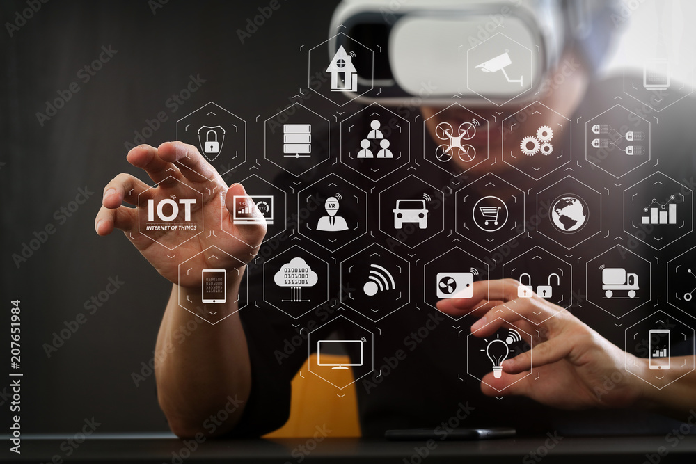 Poster businessman wearing virtual reality goggles in modern office with smartphone using with vr headset