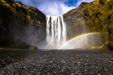 Skogafoss - May 04, 2018: Rainbows at the Skogafoss waterfall, Iceland