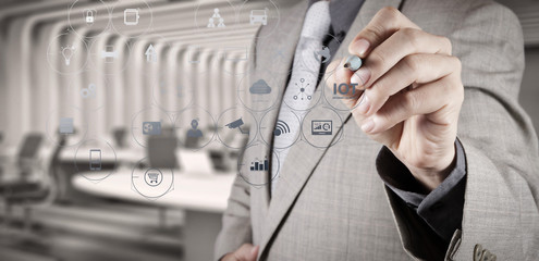 businessman hand writing in the whiteboard