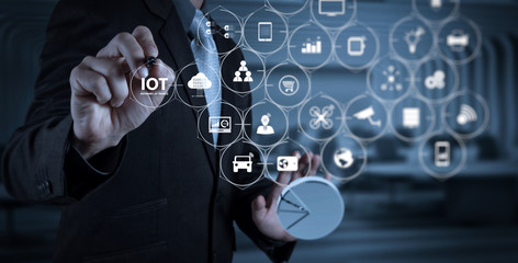 businessman hand writing in the whiteboard