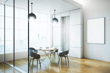 Modern kitchen dining area with poster