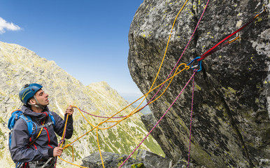 To feed out a rope.