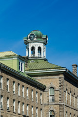 Vertical view of Brockville, Canada's city hall and clock tower.