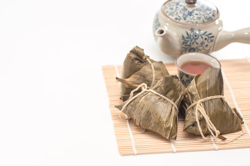 Zongzi - Traditional Dragon Boat Festival dumpling. Hand drawn watercolor painting isolated on white background.