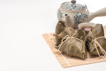 Zongzi - Traditional Dragon Boat Festival dumpling. Hand drawn watercolor painting isolated on white background.