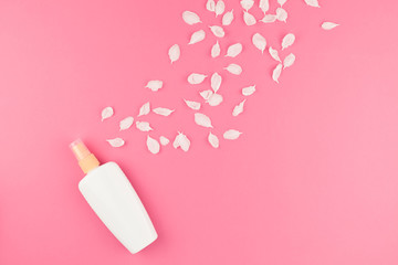 Sunscreen blank bottle mockup with petals