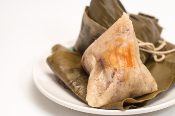 Zongzi - Traditional Dragon Boat Festival dumpling. Hand drawn watercolor painting isolated on white background.