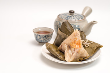 Zongzi - Traditional Dragon Boat Festival dumpling. Hand drawn watercolor painting isolated on white background.