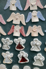 Angels, stall with decorations for winter holidays at traditional annual Christmas market in Zagreb, Croatia 