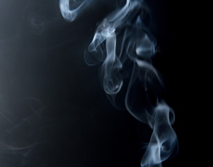 Obraz premium Texture of smoke clubs on a dark background.