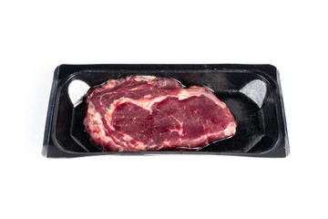 Raw steak in plastic pack.