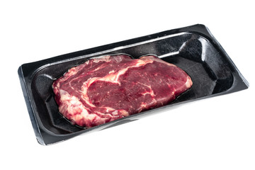 Raw steak in plastic pack.