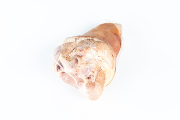 A raw pork hock wrapped by plastic.
