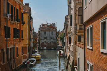 Fototapeta na wymiar Venice landscape - beautiful and colorful buildings on a canal
