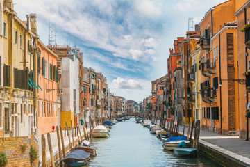 Fototapeta na wymiar Venice landscape - beautiful and colorful buildings on a canal