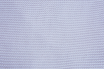 White knitted needles texture, pigtails, vertical.